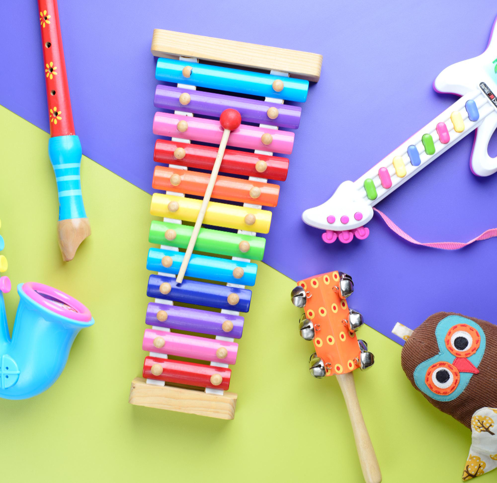 Baby playing with colorful musical toys
